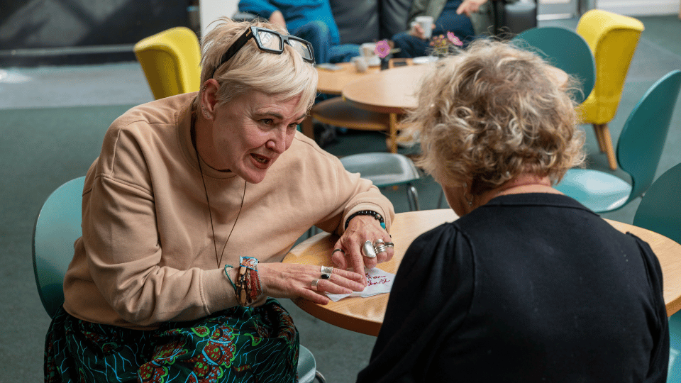 Threads of Freedom - at The Spring 2025 - Helen, lead artist with member of the public Threads of Freedom - at The Spring 2025 - Helen, lead artist with member of the public